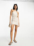 ASOS DESIGN twist neck halter mini dress with ruched skirt in oatmeal