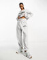 Фото #6 товара ASOS DESIGN jogger co-ord with sports graphic logo in ice marl