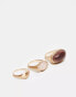 Фото #1 товара ASOS DESIGN Curve pack of 3 rings with semi precious style stone set in brushed gold tone