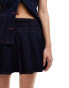 ASOS DESIGN denim pleated mini skirt in mid blue