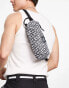 Volcom hager bum bag with geo print in white and black