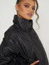 Aria Cove cropped wet look padded coat with detachable sleeves in black