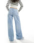 Фото #2 товара Bershka high waisted wide leg jeans in light wash blue