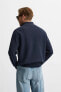 HIGH NECK QUARTER-ZIP SWEATER