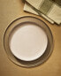 Porcelain dessert plate with antique finish rim