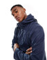 ASOS DESIGN shower resistant rubberised rain jacket in navy