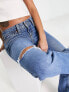 Фото #2 товара Levi's noughities boot cut distressed jeans in mid wash blue