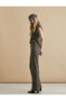 Фото #1 товара Брюки Koton Şahika Ercümen - Трикотажные, блестящие, испанские брюки