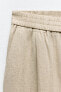 Wide-leg linen-blend trousers