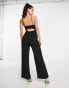 Фото #2 товара ASOS DESIGN high neck jumpsuit with cut out back in black