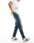 Фото #5 товара ASOS DESIGN tapered fit jeans with panelling in a vintage tint dark blue - TURQUOISE