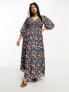 ASOS DESIGN Curve midi smock dress with shirred cuffs in black based multi floral print