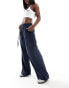 Фото #2 товара YAS premium soft touch wide leg trouser with tie waist in navy - MBLUE