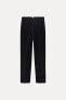 HIGH-WAIST PINSTRIPE TROUSERS