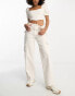 Фото #2 товара ASOS DESIGN slim cargo with lace up detail in beige co-ord