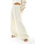 Фото #2 товара Stradivarius Petite fluid pleat front trouser in buttermilk