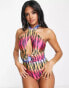 ASOS DESIGN cross neck cut out ring detail swimsuit in abstract ombre print