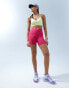 Nike Training high rise 7 inch legging shorts in fierce pink