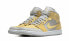 Фото #4 товара Кроссовки женские Nike Air Jordan 1 Mid смешанные текстуры желтые