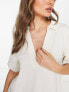 Фото #1 товара ASOS DESIGN relaxed polo shirt with deep v in sand