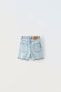 Ripped denim bermuda shorts