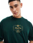 ASOS DESIGN oversized t-shirt in dark green with chest text print Зеленый, M - Chest 40 - фото #1