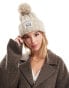 Levi's speckled cable knit pom pom beanie with patch logo in beige