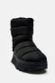 Flat quilted ankle boots with faux shearling