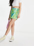 ASOS DESIGN wrap tie skort in green meadow floral print