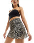 Фото #6 товара Reclaimed Vintage mini skirt with bow detail in animal print co-ord