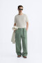 Relaxed fit trousers with belt