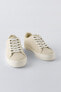 Minimalist lace-up sneakers