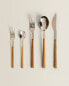 Set of dessert spoons with wood-effect handle