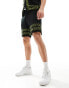 ASOS DESIGN co-ord knitted shorts in black with green border