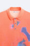 Knit polo shirt with abstract print