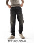 ASOS DESIGN tapered fit jeans with carpenter detail in washed black - BLACK