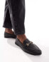 Accessorize snaffle loafers in black