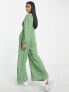 Фото #7 товара Glamorous Petite v-neck button front jumpsuit in green mini daisy print