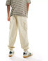 Фото #2 товара ASOS DESIGN oversized tapered cargo trousers in stone