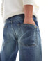 Фото #5 товара ASOS DESIGN stretch tapered jeans in tinted vintage wash