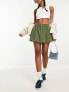 Фото #1 товара New Look pleated mini skirt in dark khaki