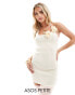 Фото #1 товара ASOS DESIGN Petite knitted rose mini dress in cream