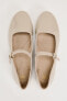 Faux patent ballet flats with ankle strap