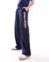 Фото #4 товара Polo Ralph Lauren Sport Capsule joggers with side logo in navy