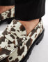 Truffle Collection chunky penny loafers in cow print