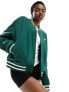 New Balance Sportswear Greatest Hits varsity bomber jacket in green