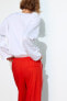 Cropped trousers with side stripe