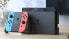 Nintendo Switch (OLED-Modell) Neon-Rot/Neon-Blau + Nintendo eShop Card | 25 EUR Guthaben (Download Code)