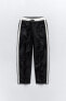 Nylon jogger trousers with side stripe