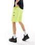 The North Face logo pocket shorts in lime